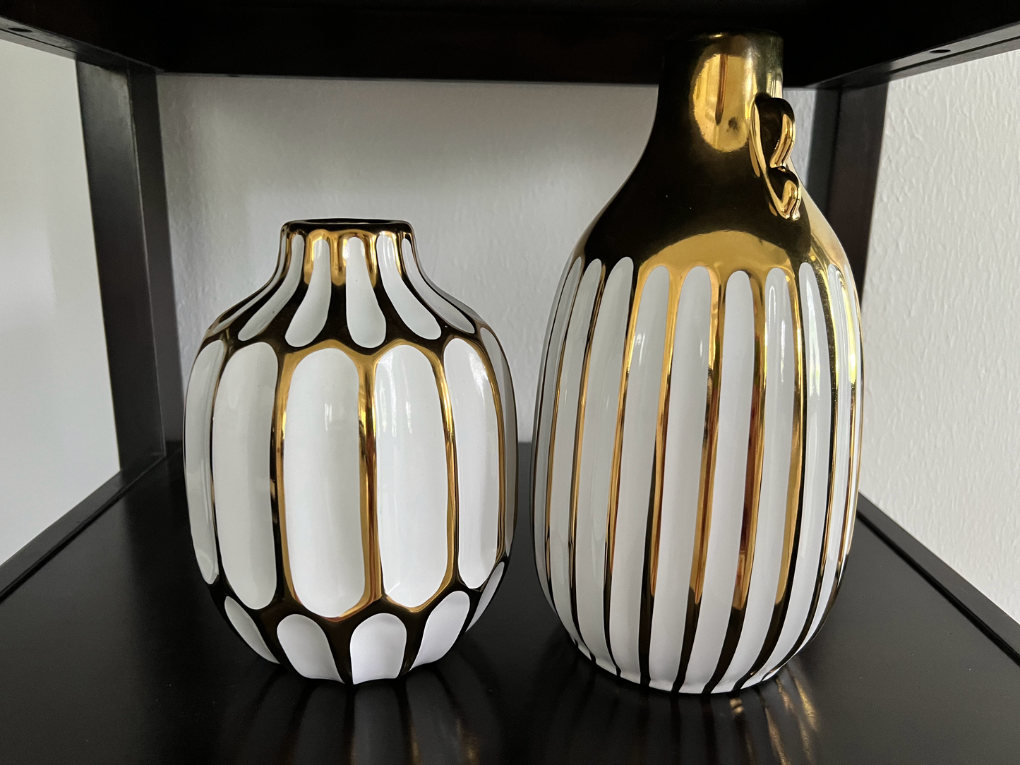 Two Gold and White Vases
